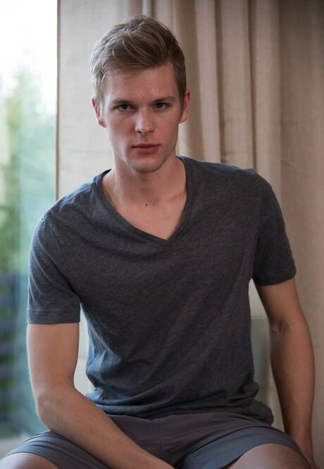 Two american boys beefy Justin Owen and young boy Ty Thomas love each other outdoor