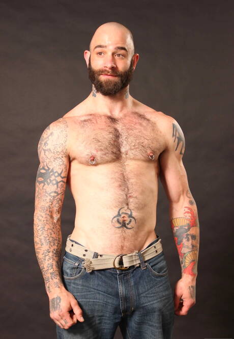 Canadian hairy bear Sam Swift and ebony stud Jay Black in interracial blowjob scene