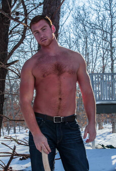 Two american boys strongman Connor Maguire and tough guy Dirk Caber shows a well-build body outdoor