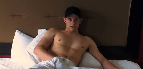 Tough guy Jason playing with cock