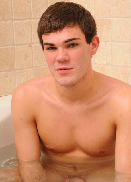 Hunky guy Phat Daddy and american young boy Leon Knight wanking in bathroom