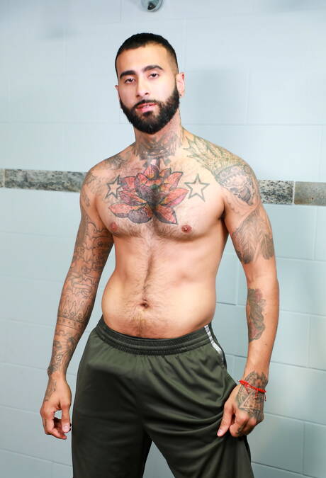 Puerto rican stud Rikk York and latin mature bear Julian Torres sucking and fucking each other in hot shower