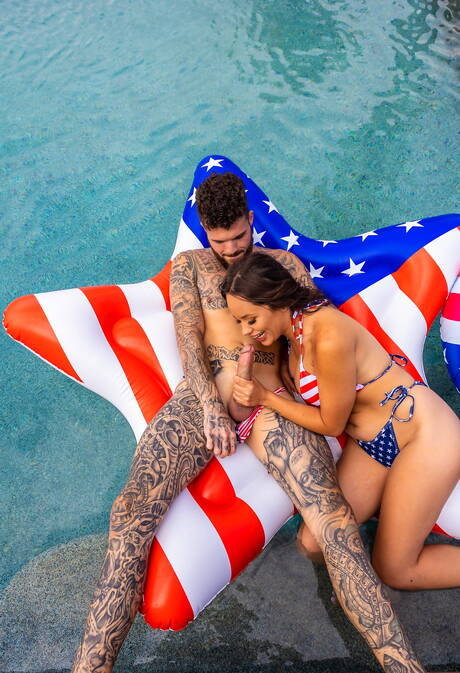 Bisexual orgy in the pool on american national flag