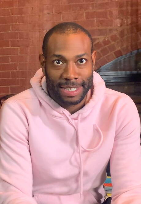 Ebony strongman August Alexander and stud Santino Cruz in bondage sex scene