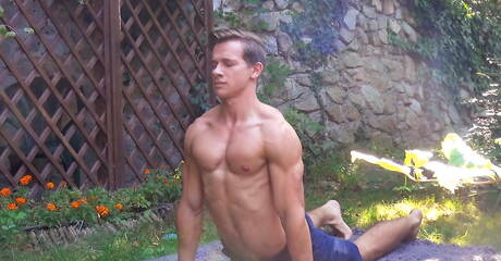 Swedish young boy Henrik Bjorn and czech husky guy Bob Marghiela make a love outdoor