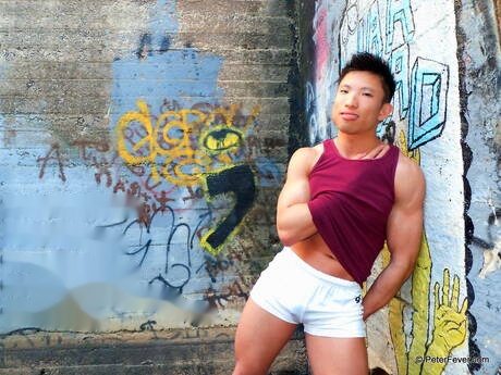 Asian muscular Jessie Lee get naked and showing his ass outdoor