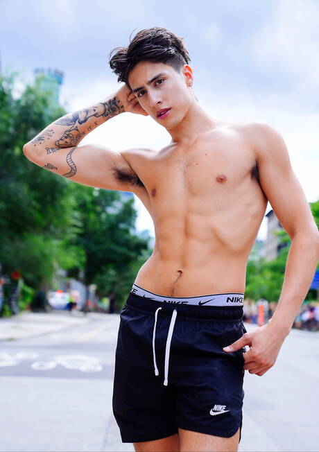 Latin well-built Angel Elias and oriental young dude Cody Seiya have a good anal sex outside