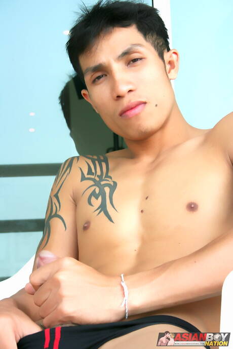 Oriental strongman Rock Keng masturbating