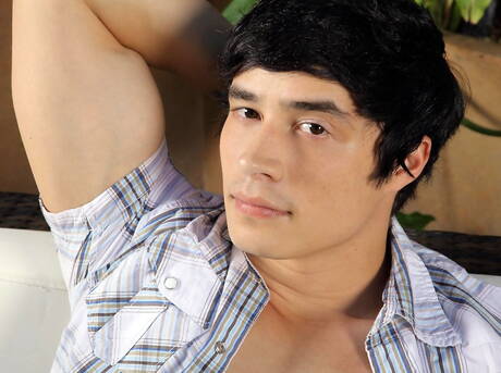 Asian stud Damon Sparks playing with cock outdoor