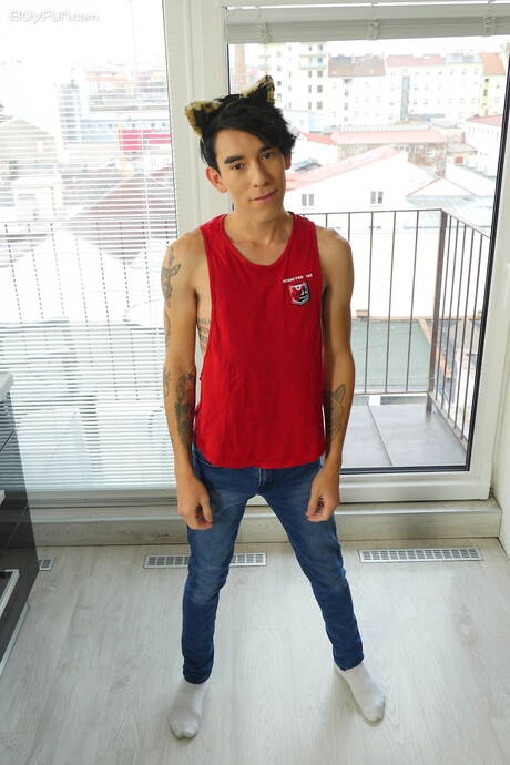 Latino twink Roman Capellini posing nude and showing hot butt in the kitchen